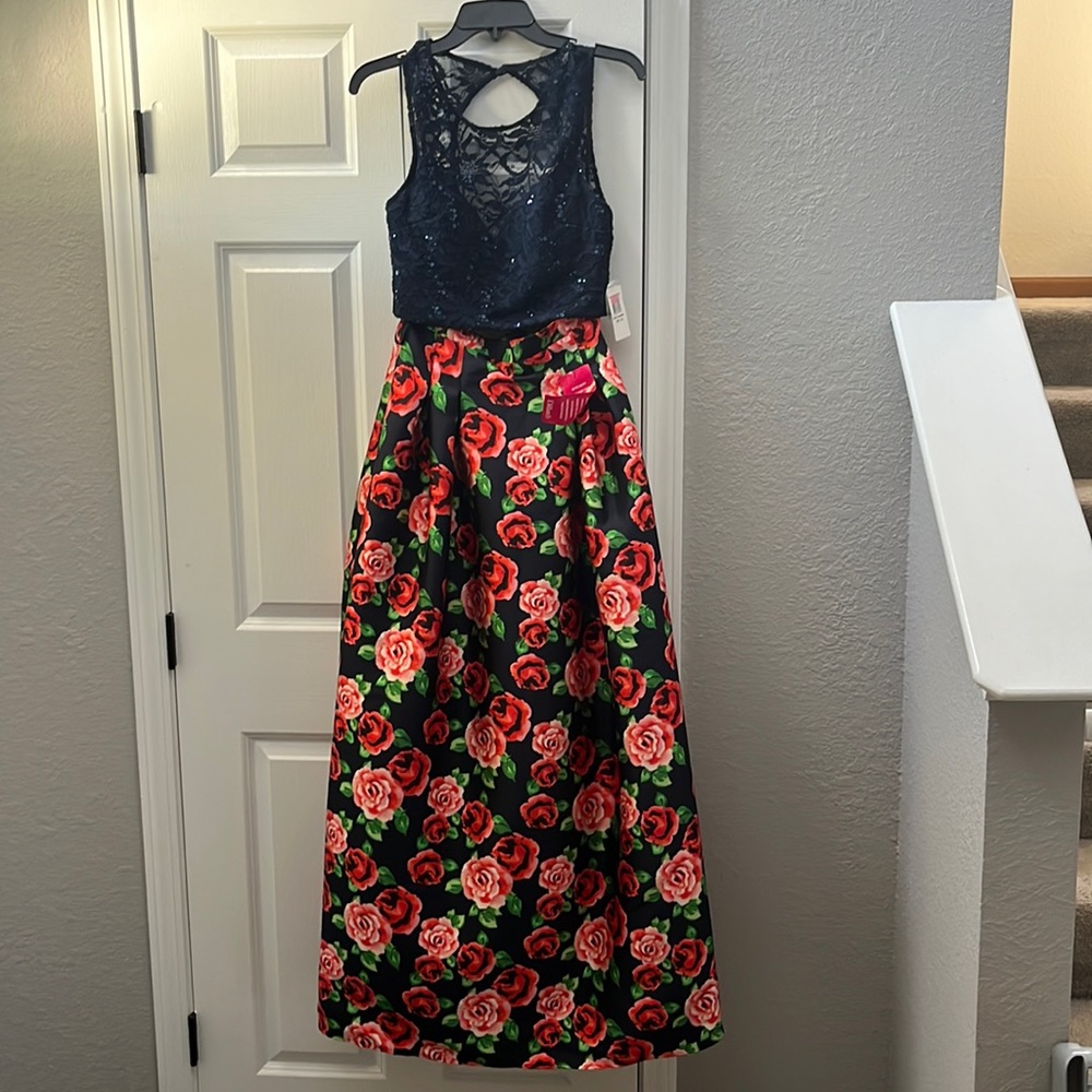 a 2 piece prom dress, tags still on, navy and red/pink roses